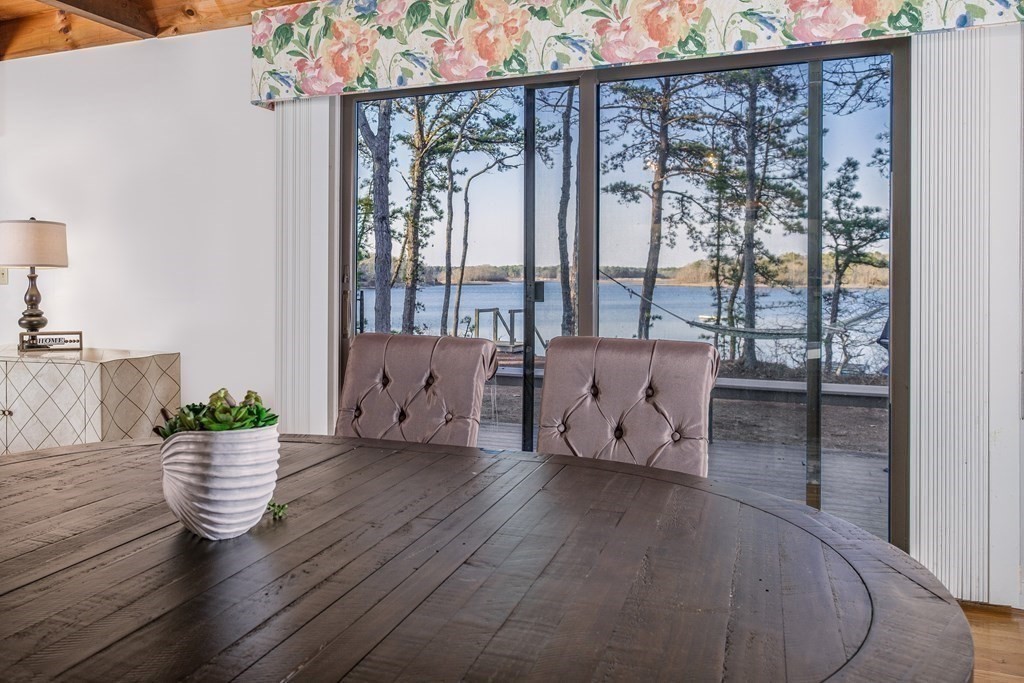 61 Tide Run Mashpee, MA 02649 - Photo 12 of 39 a living room with furniture and wooden floor