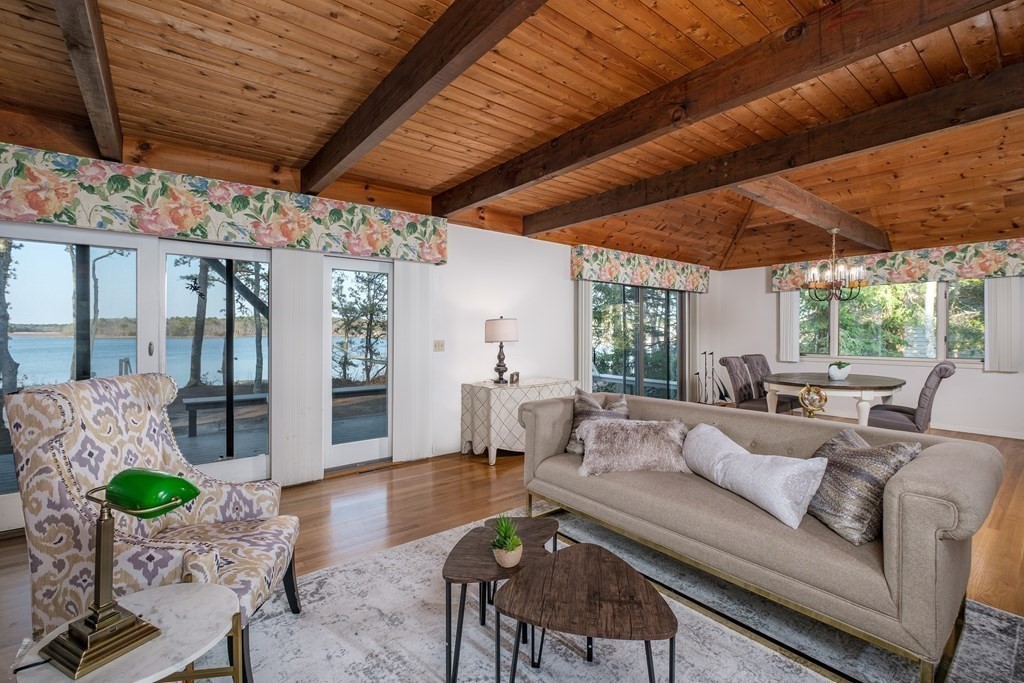 61 Tide Run Mashpee, MA 02649 - Photo 16 of 39 a living room with furniture and wooden floor