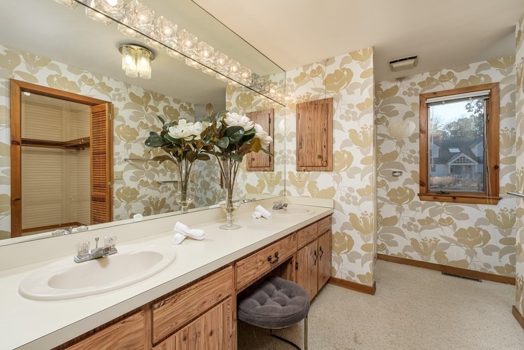 61 Tide Run Mashpee, MA 02649 - Photo 21 of 39 a bathroom with a sink double vanity and a mirror