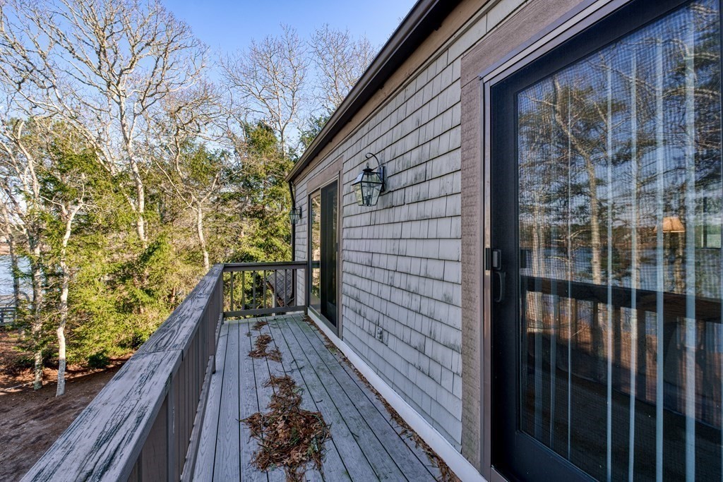 61 Tide Run Mashpee, MA 02649 - Photo 33 of 39 a view of balcony with wooden floor