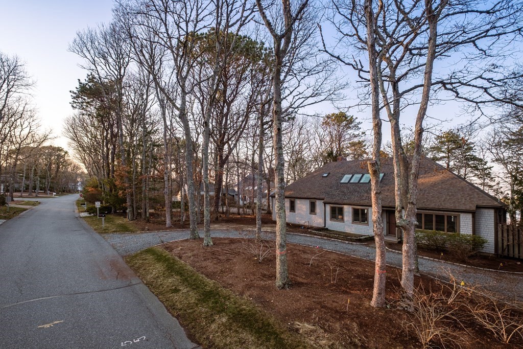 61 Tide Run Mashpee, MA 02649 - Photo 38 of 39 a view of a house with a yard