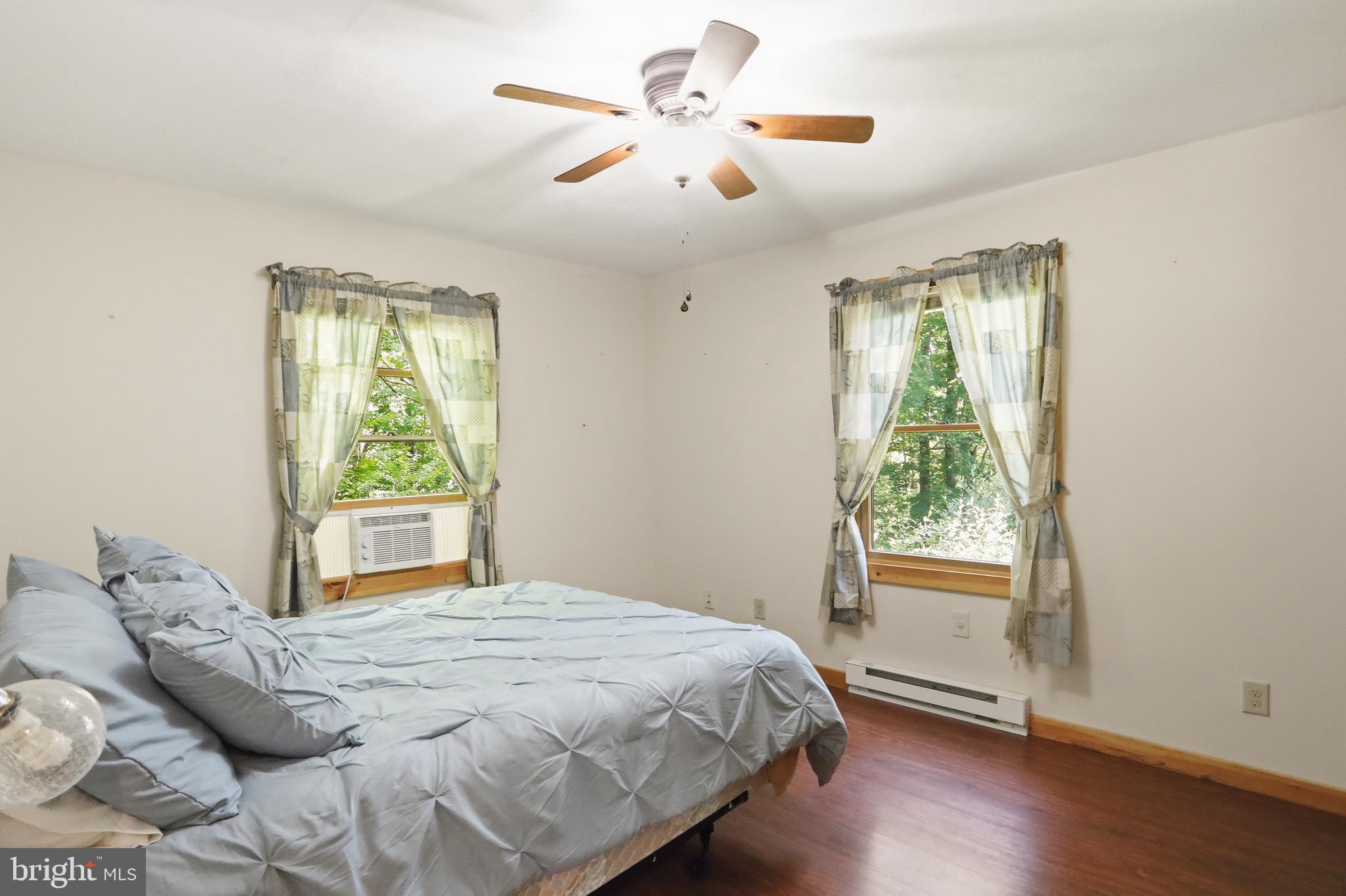 1400 Core Road Romney, WV 26757 - Photo 40 of 73 a bedroom with a bed and a window
