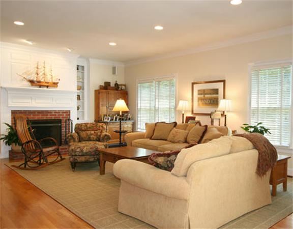 45 Deerpath Road Dedham, MA 02026 - Photo 3 of 12 a living room with furniture and a fireplace