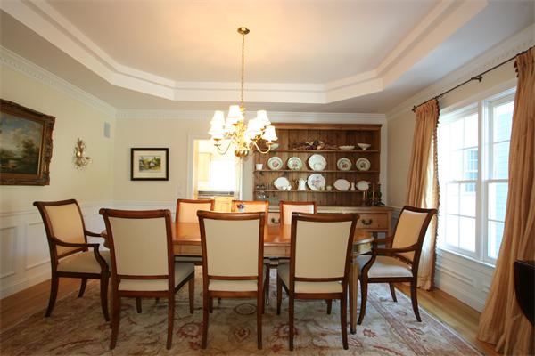 45 Deerpath Road Dedham, MA 02026 - Photo 5 of 12 a dining room with furniture a chandelier and wooden floor
