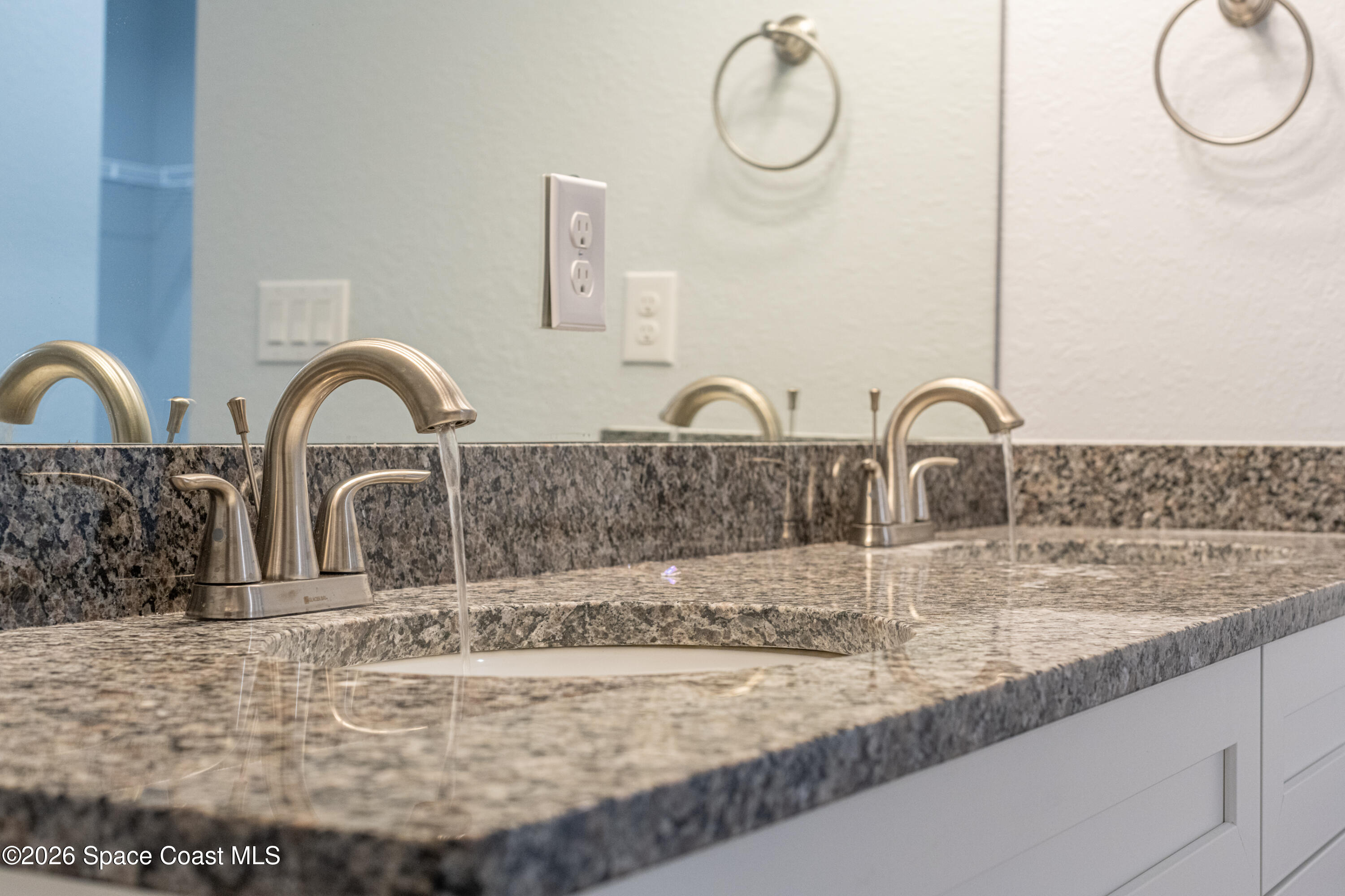 1434 Weiman Road Southeast Palm Bay, FL 32909 - Photo 26 of 38 26. Primary Bathroom Sinks Detail