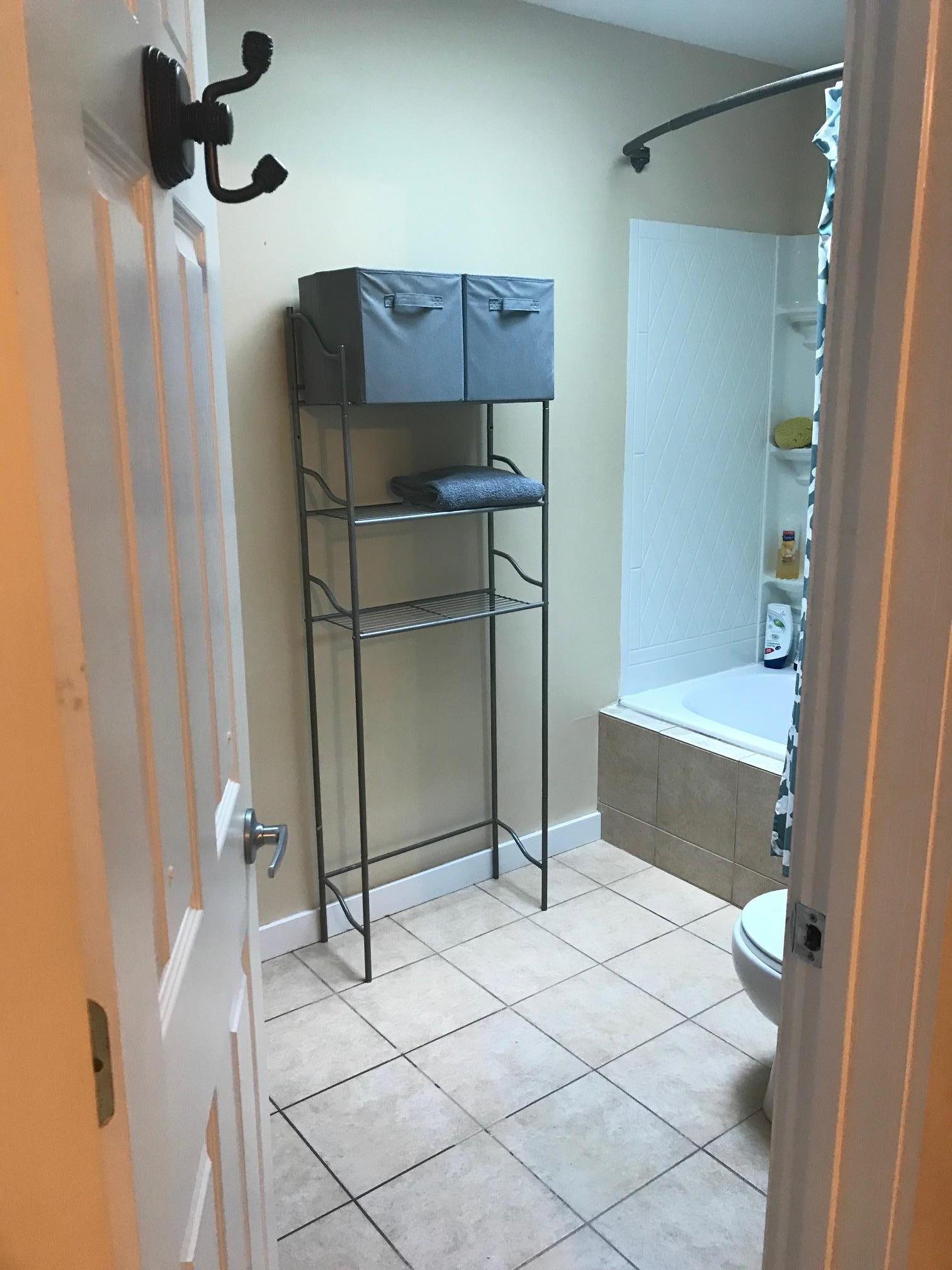 213 South Dickerson Chapel Road Lebanon, TN 37087 - Photo 26 of 30 a bathroom with a tub and shower