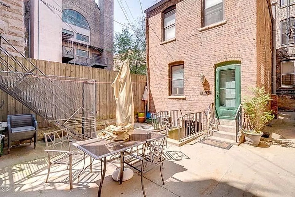 642 North Dearborn Street, Unit CH Chicago, IL 60654 - Photo 9 of 19 a view of a patio with couple of chairs