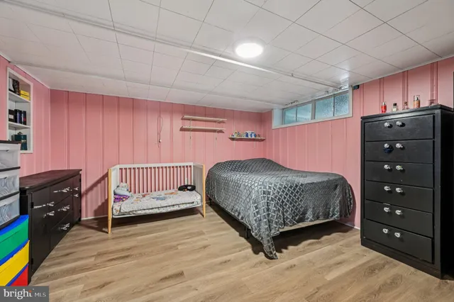 a bedroom with a bed and a closet