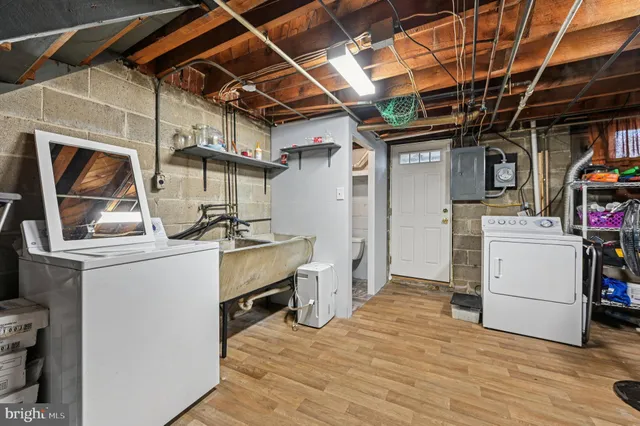 a storage room with washer and dryer