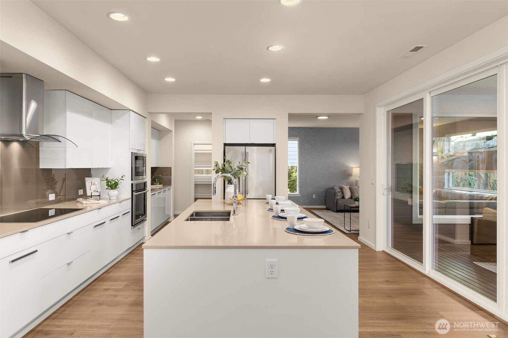 19387 135th Street Southeast Monroe, WA 98272 - Photo 13 of 40 a kitchen with refrigerator and cabinets