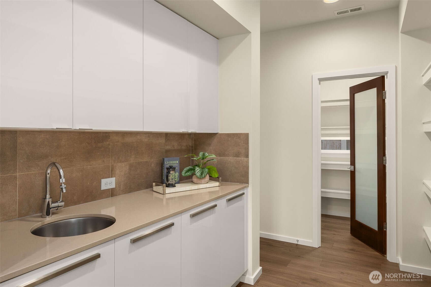 19387 135th Street Southeast Monroe, WA 98272 - Photo 15 of 40 a kitchen with a sink and a window