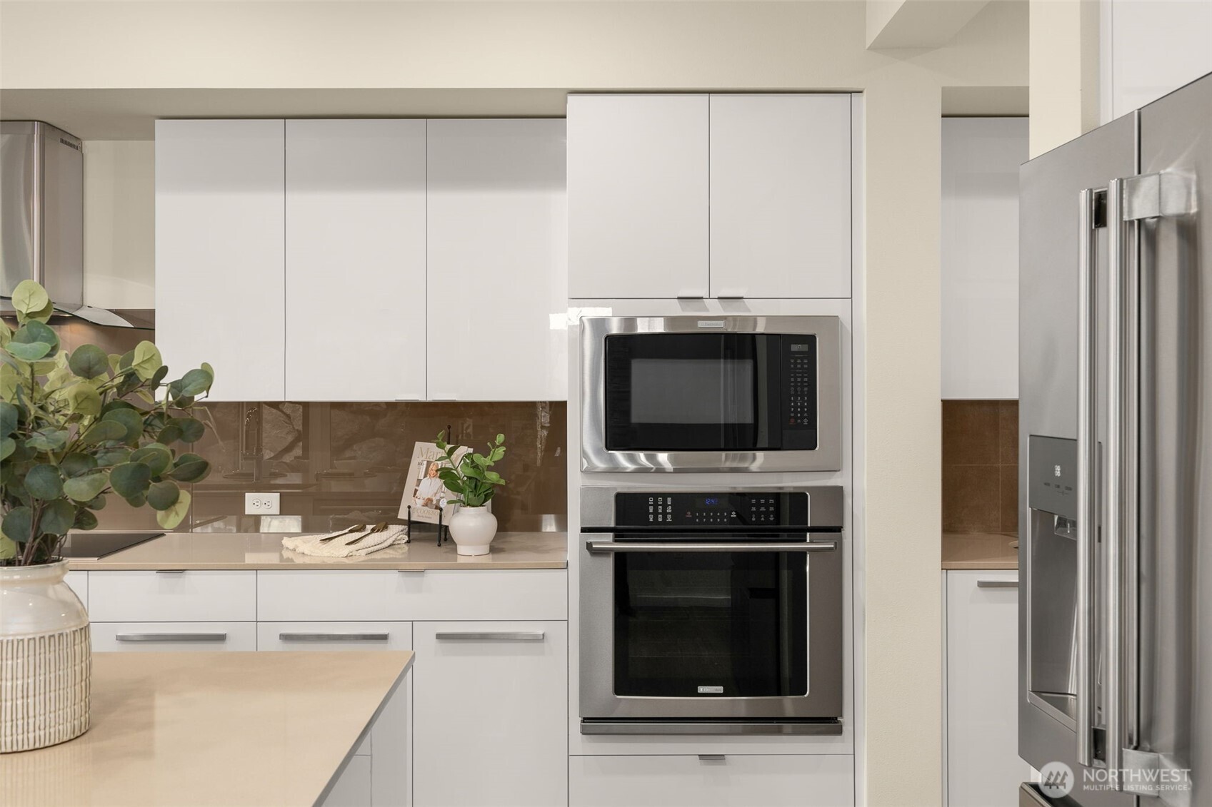 19387 135th Street Southeast Monroe, WA 98272 - Photo 17 of 40 a kitchen with a refrigerator stove and microwave