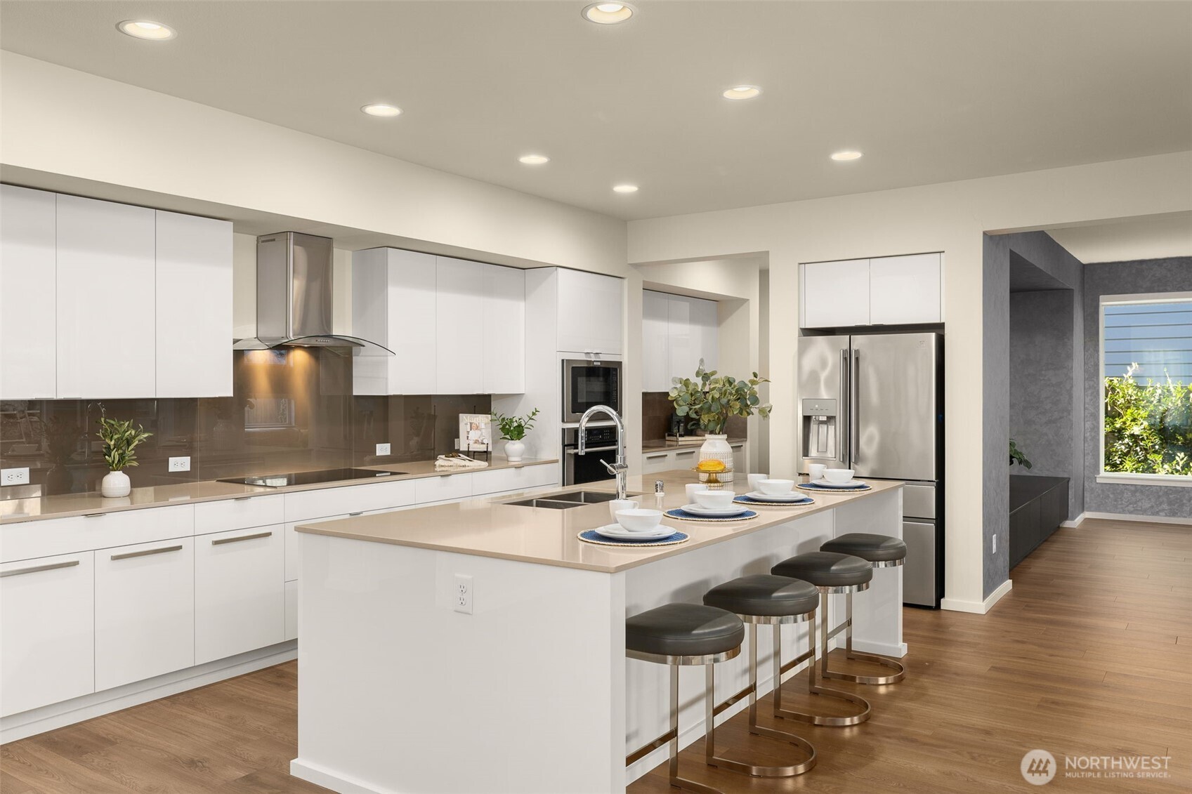 19387 135th Street Southeast Monroe, WA 98272 - Photo 18 of 40 a kitchen with a sink stainless steel appliances and cabinets