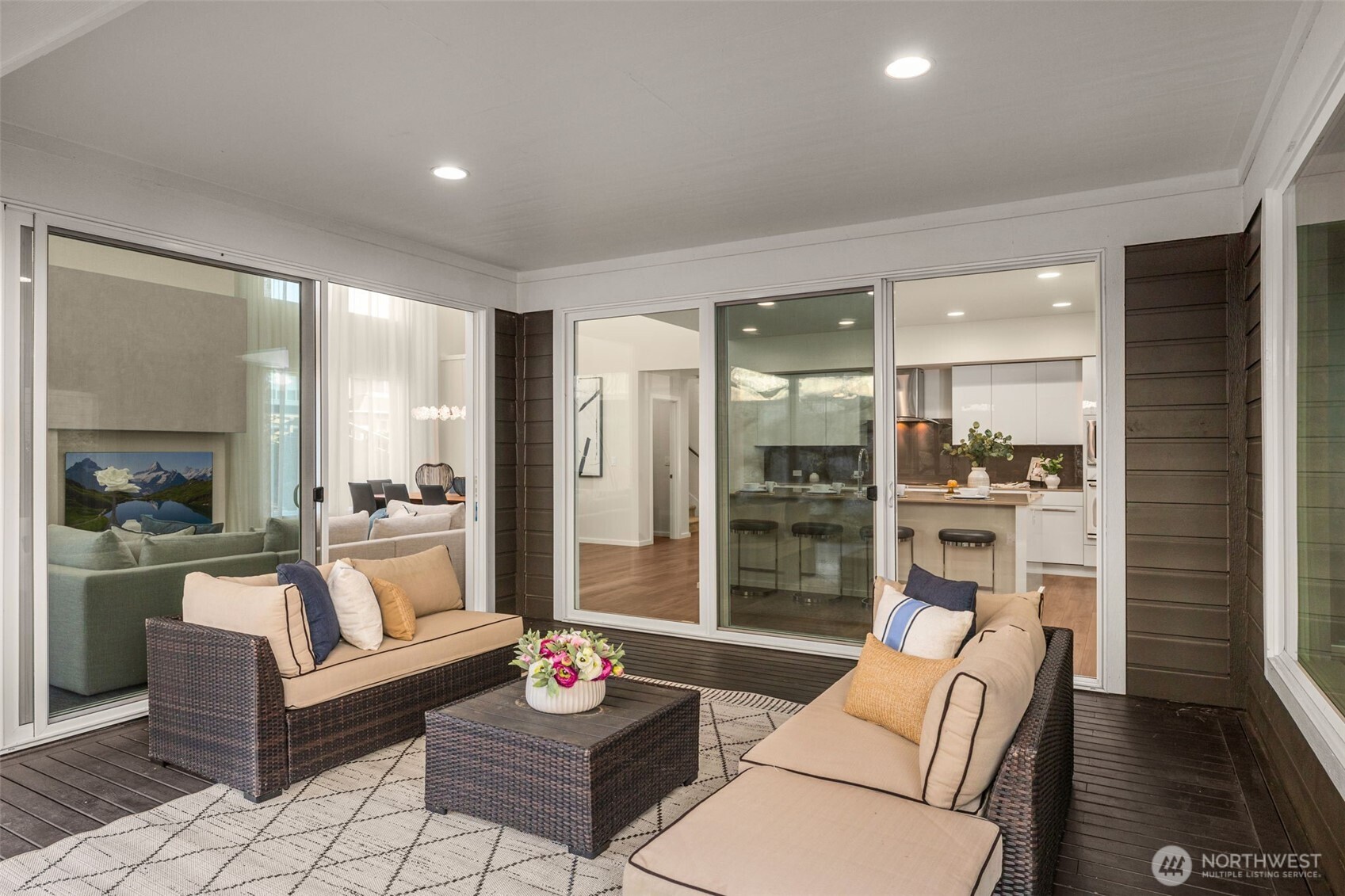 19387 135th Street Southeast Monroe, WA 98272 - Photo 19 of 40 a living room with furniture and a dining table with kitchen view