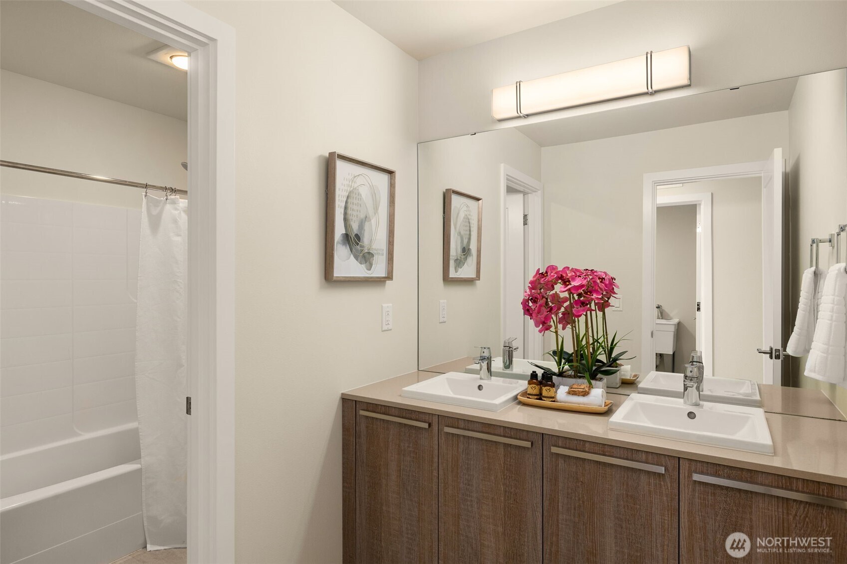 19387 135th Street Southeast Monroe, WA 98272 - Photo 24 of 40 a view of a bathroom with a sink and mirror