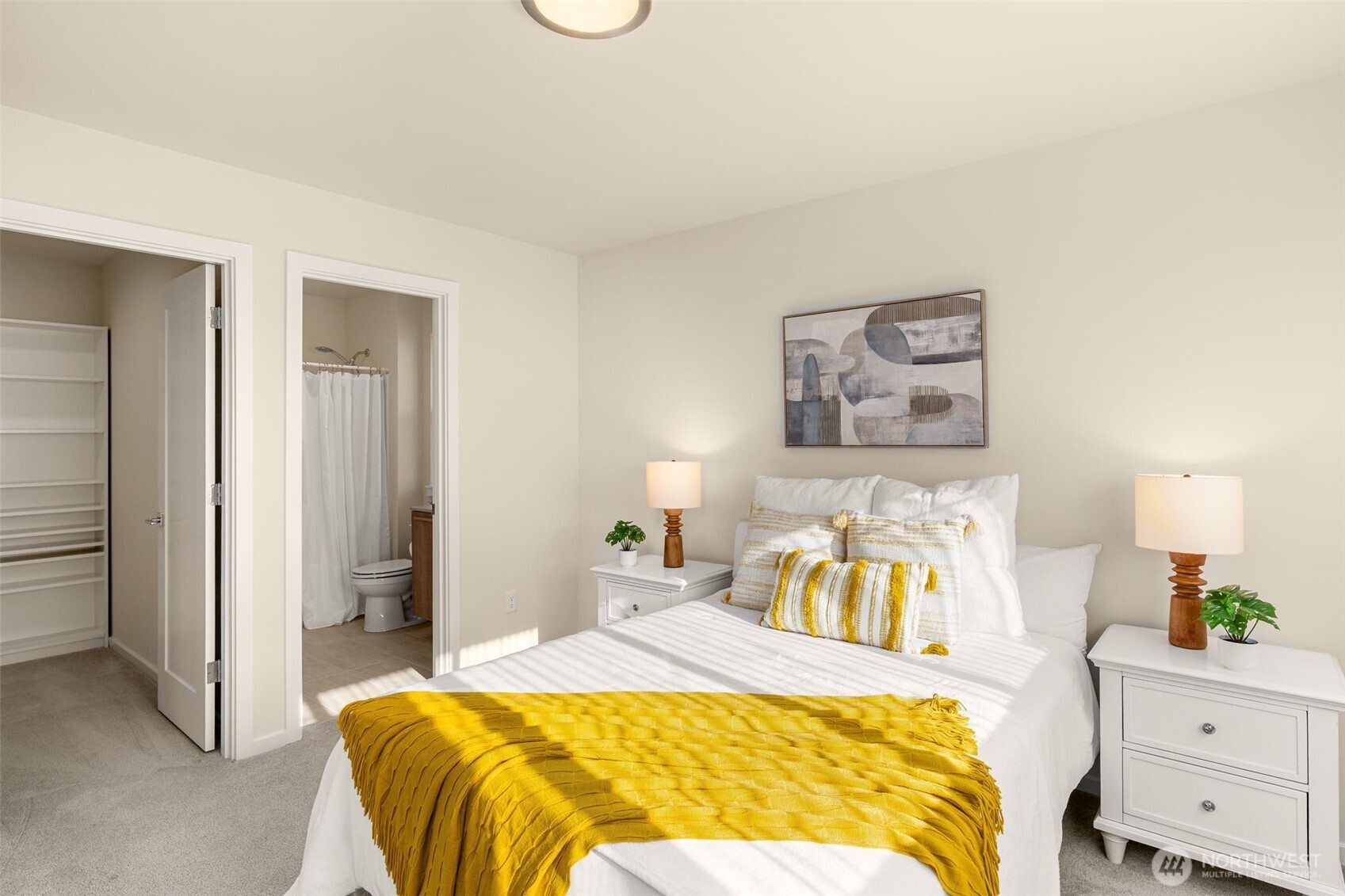 19387 135th Street Southeast Monroe, WA 98272 - Photo 26 of 40 a bedroom with a bed and a lamp on dresser