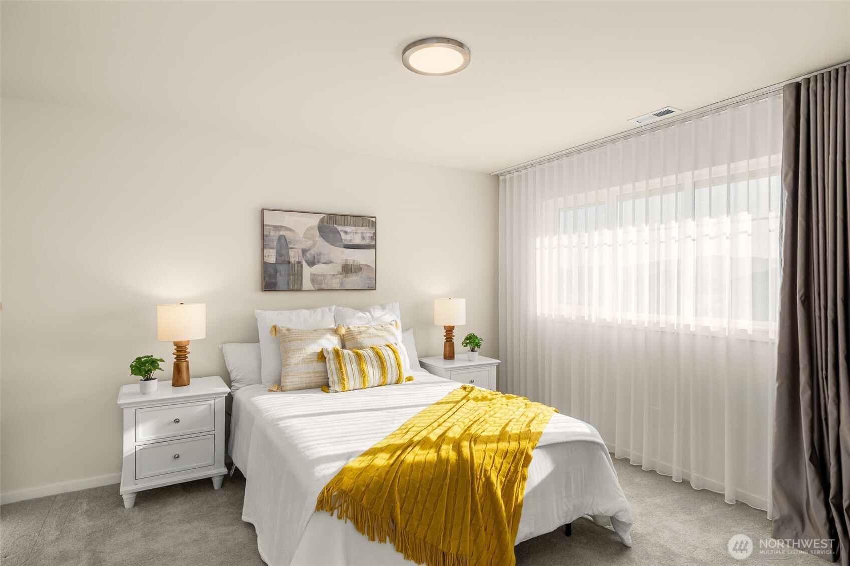 19387 135th Street Southeast Monroe, WA 98272 - Photo 28 of 40 a bedroom with a bed and painting on the wall