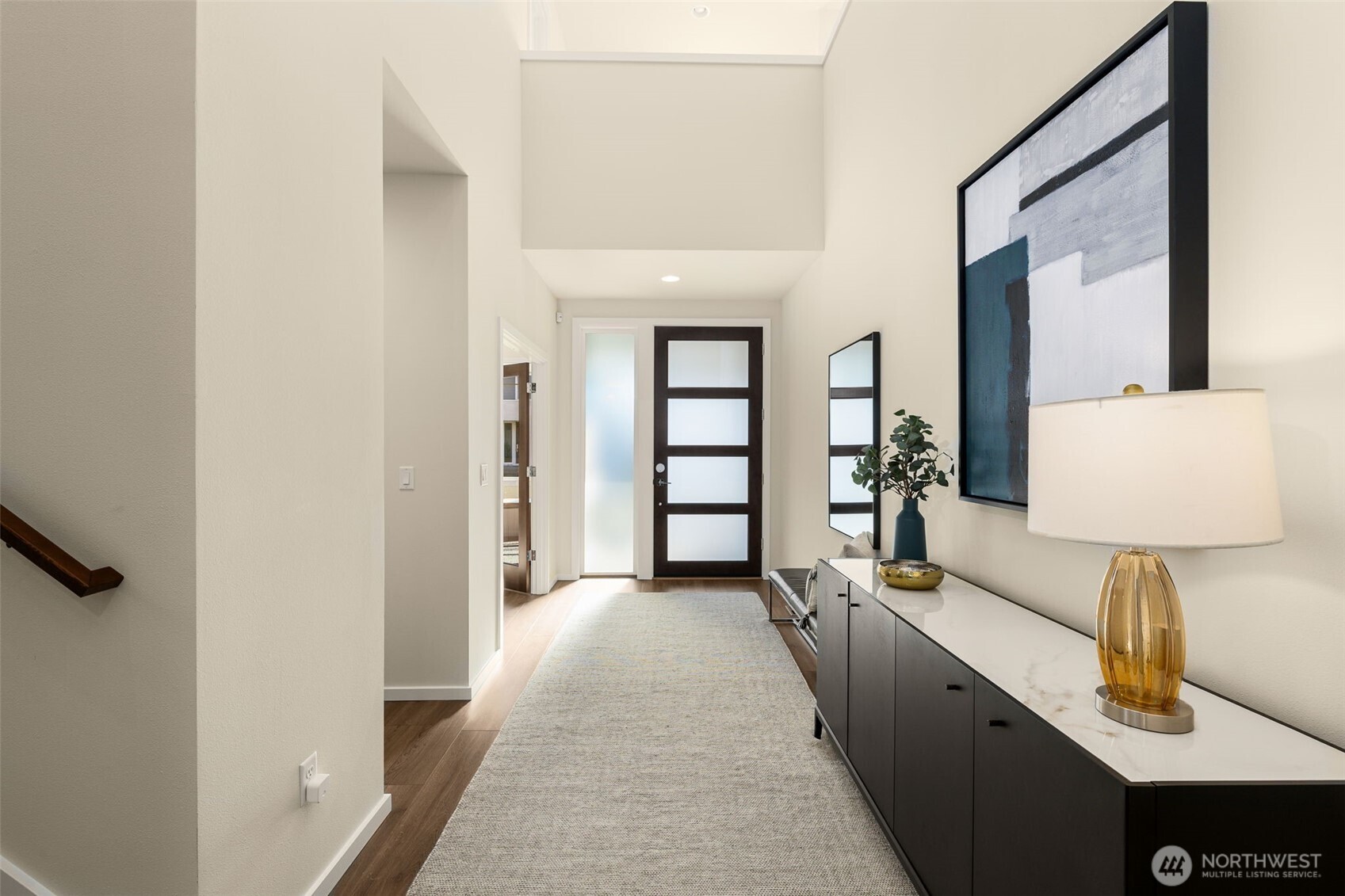 19387 135th Street Southeast Monroe, WA 98272 - Photo 5 of 40 a view of a hallway with furniture and a window