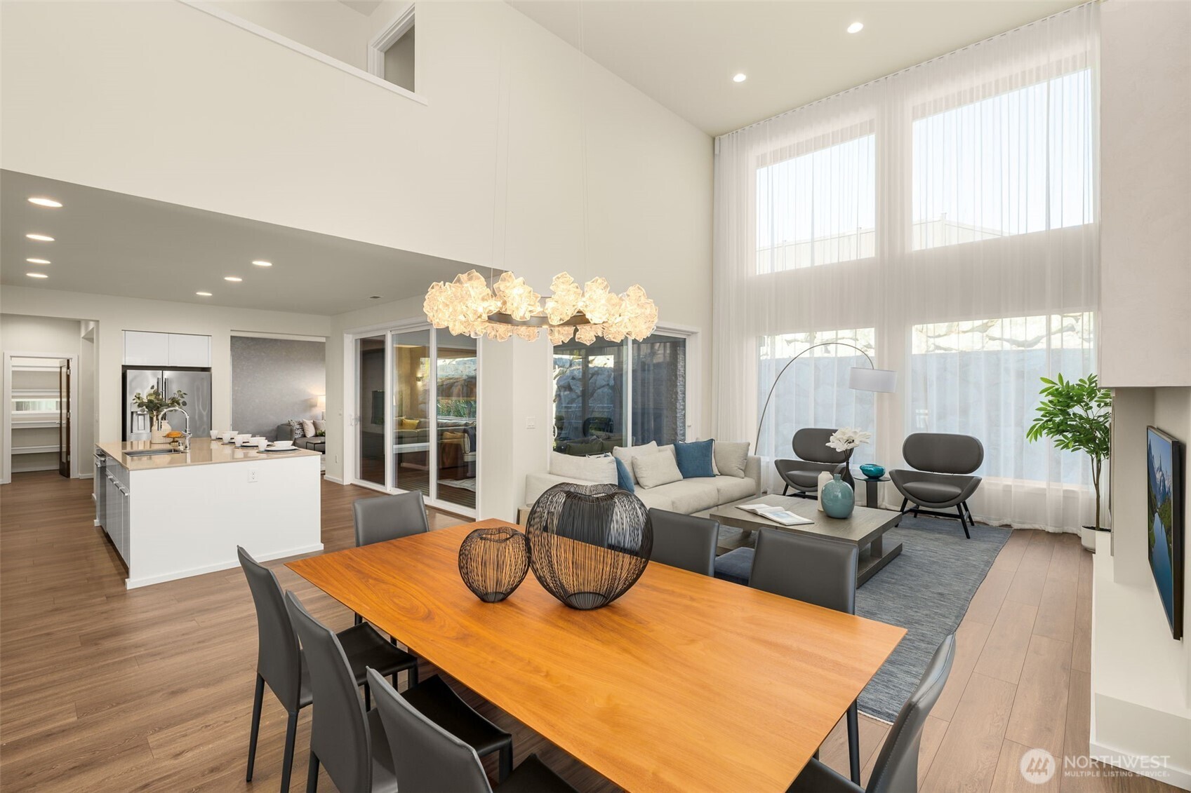 19387 135th Street Southeast Monroe, WA 98272 - Photo 8 of 40 a view of a dining room with furniture window and wooden floor