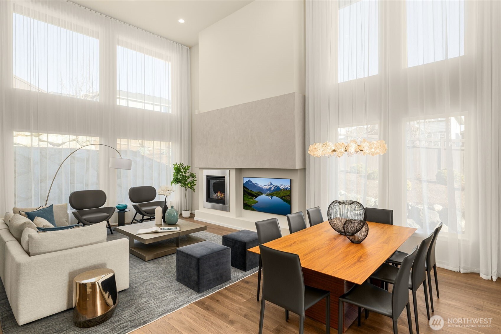 19387 135th Street Southeast Monroe, WA 98272 - Photo 10 of 40 a living room with fireplace furniture and a large window