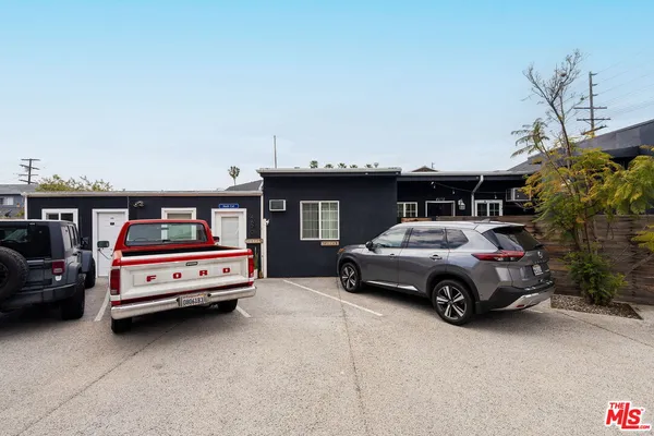 a car parked in front of a house