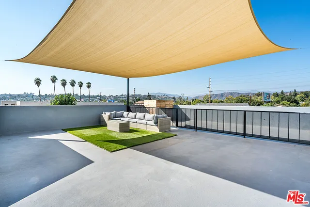 a view of a chair and tables