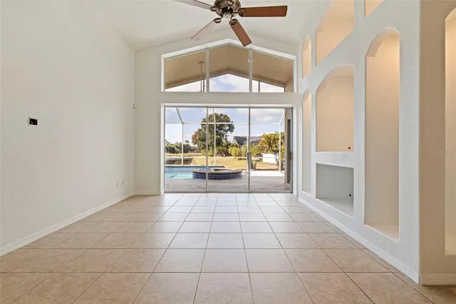 a view of a hallway with a chandelier