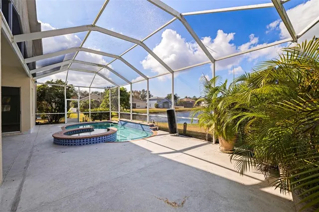 a view of a swimming pool with a sitting space