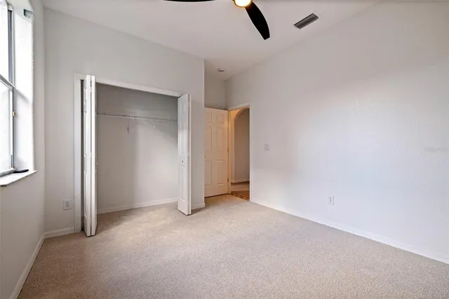 an empty room with glass door