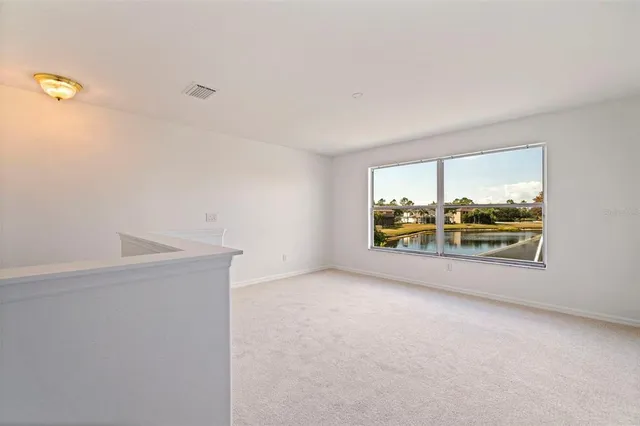 a view of a swimming pool with an outdoor space
