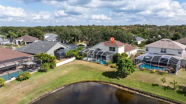 an aerial view of a house with a garden