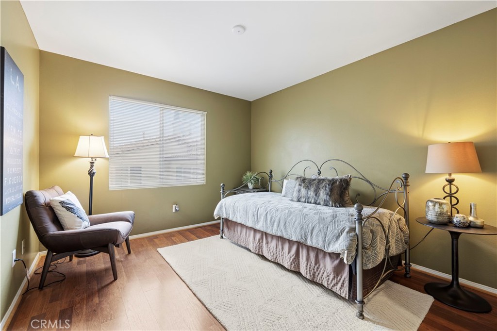 28940 Mirada Circulo Valencia, CA 91354 - Photo 11 of 25 a bedroom with a bed and window