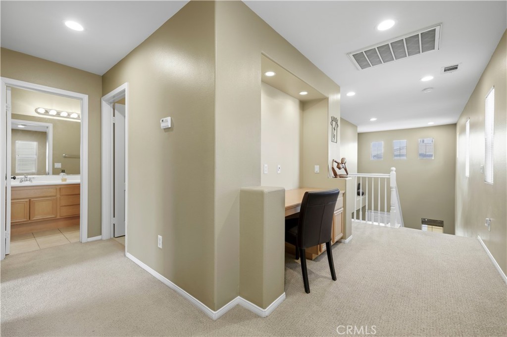 28940 Mirada Circulo Valencia, CA 91354 - Photo 12 of 25 a view of a hallway with bathroom and a bathroom