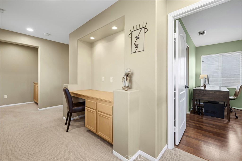 28940 Mirada Circulo Valencia, CA 91354 - Photo 13 of 25 a view of a hallway with seating area