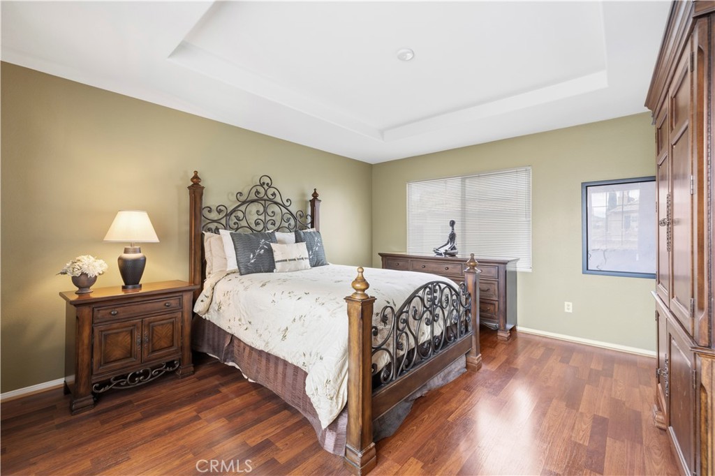 28940 Mirada Circulo Valencia, CA 91354 - Photo 14 of 25 a bedroom with bed and window