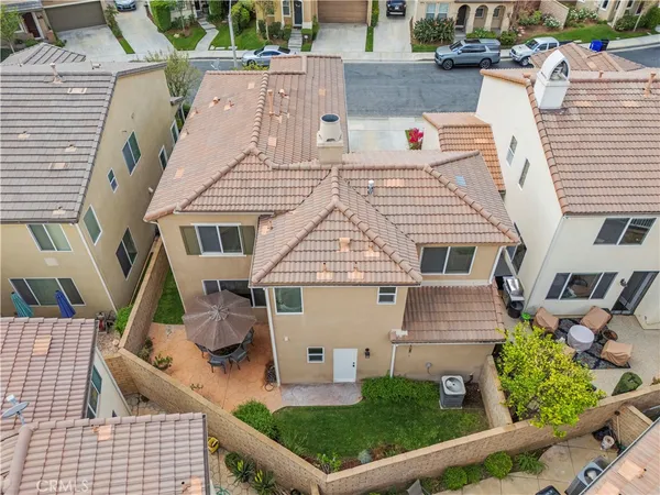 an aerial view of a house with swimming pool