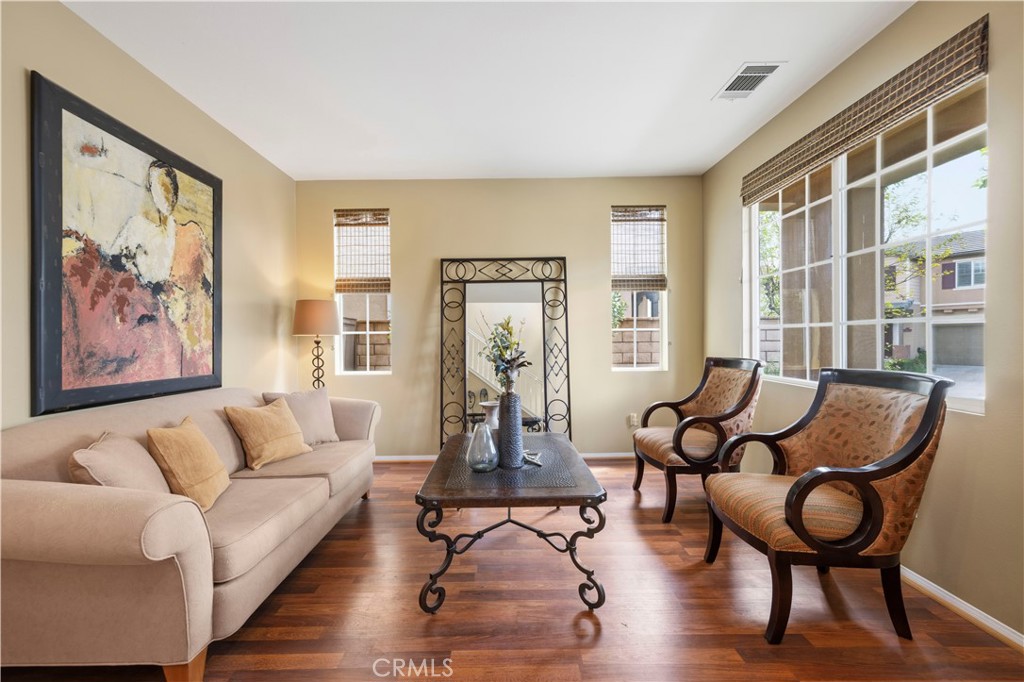 28940 Mirada Circulo Valencia, CA 91354 - Photo 4 of 25 a living room with furniture