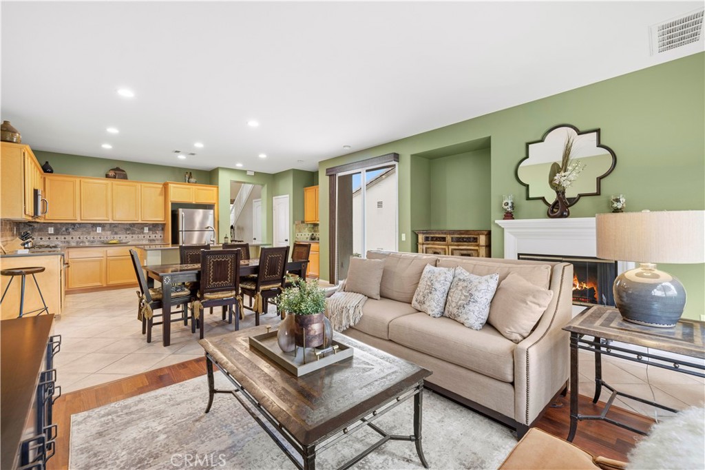 28940 Mirada Circulo Valencia, CA 91354 - Photo 8 of 25 a living room with furniture kitchen view and a large window