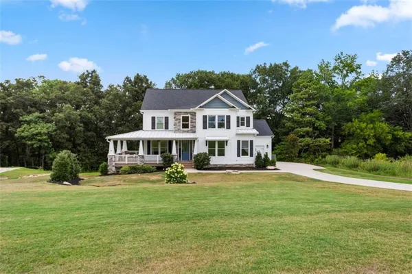 a view of a house with a big yard