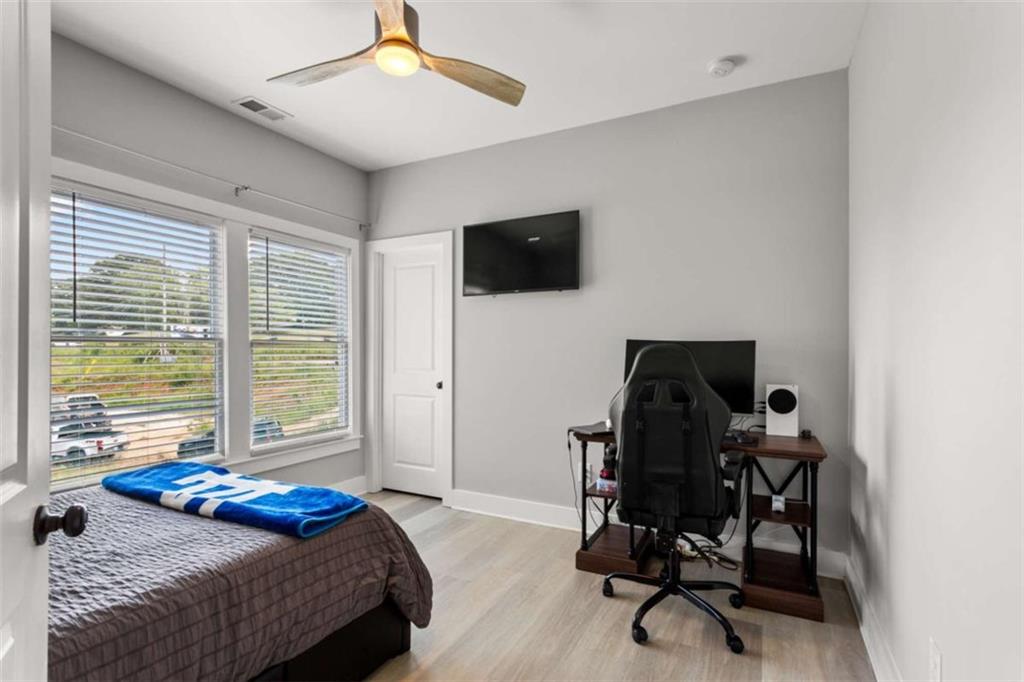 1585 Dabbs Bridge Road Dallas, GA 30132 - Photo 22 of 32 a bedroom with a workspace