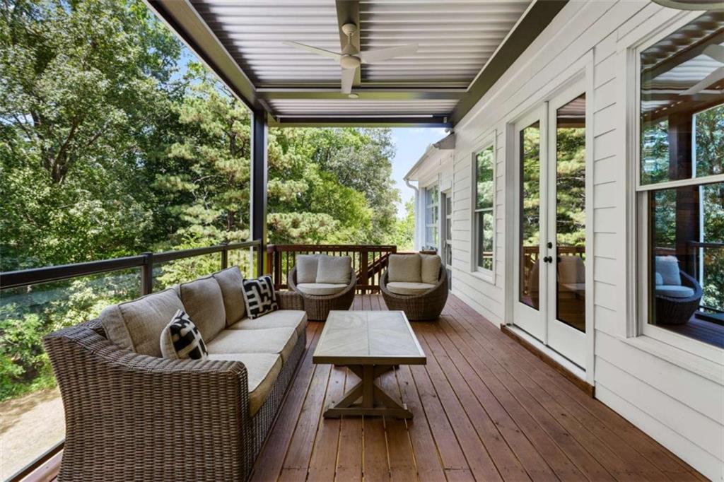 1585 Dabbs Bridge Road Dallas, GA 30132 - Photo 30 of 32 a view of balcony with couch and outdoor seating