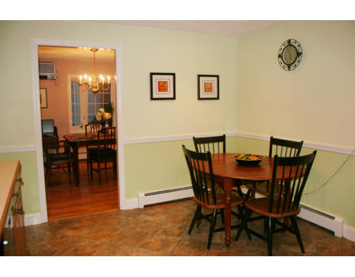 36 Hemlock Road Reading, MA 01867 - Photo 11 of 14 a view of a dining room with furniture