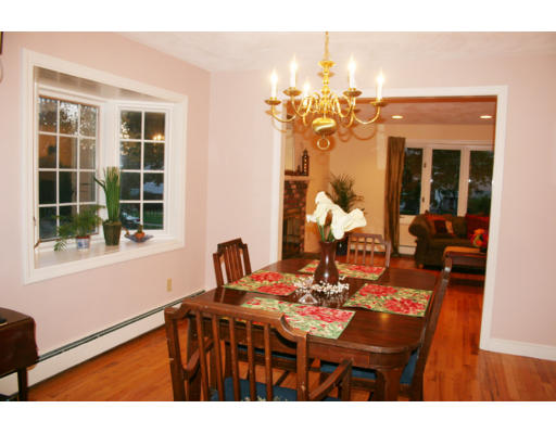 36 Hemlock Road Reading, MA 01867 - Photo 3 of 14 a view of a dining room with furniture and chandelier