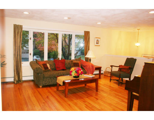 36 Hemlock Road Reading, MA 01867 - Photo 6 of 14 a outdoor living space with furniture and a floor to ceiling window