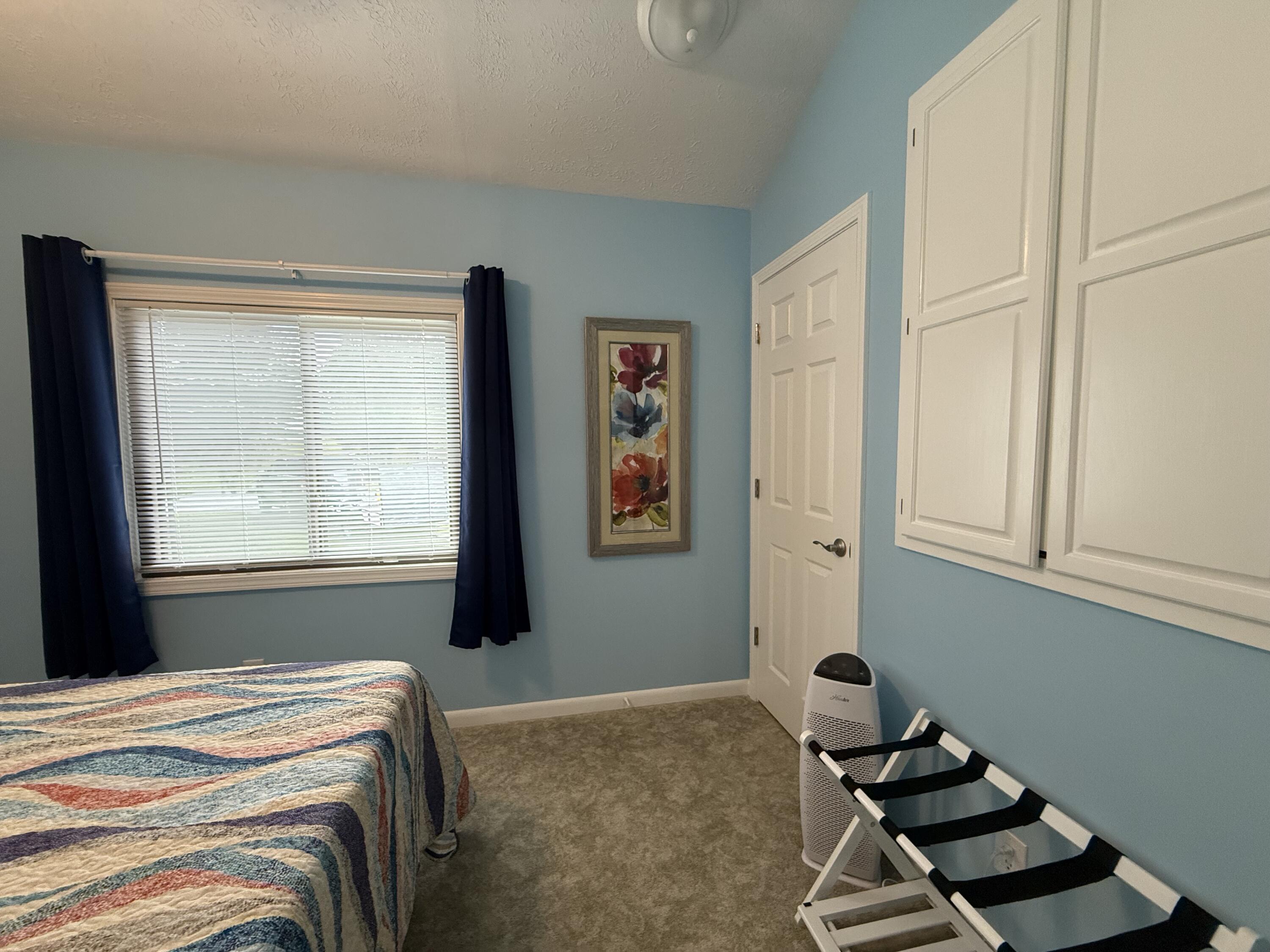 145 State Park Road, Unit B1 Jamestown, KY 42629 - Photo 39 of 59 Guest room with window and closets