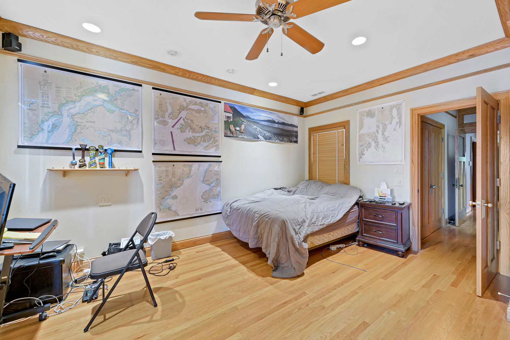 Undisclosed Address Chicago, IL 60657 - Photo 11 of 18 a bedroom with a bed and wooden floor