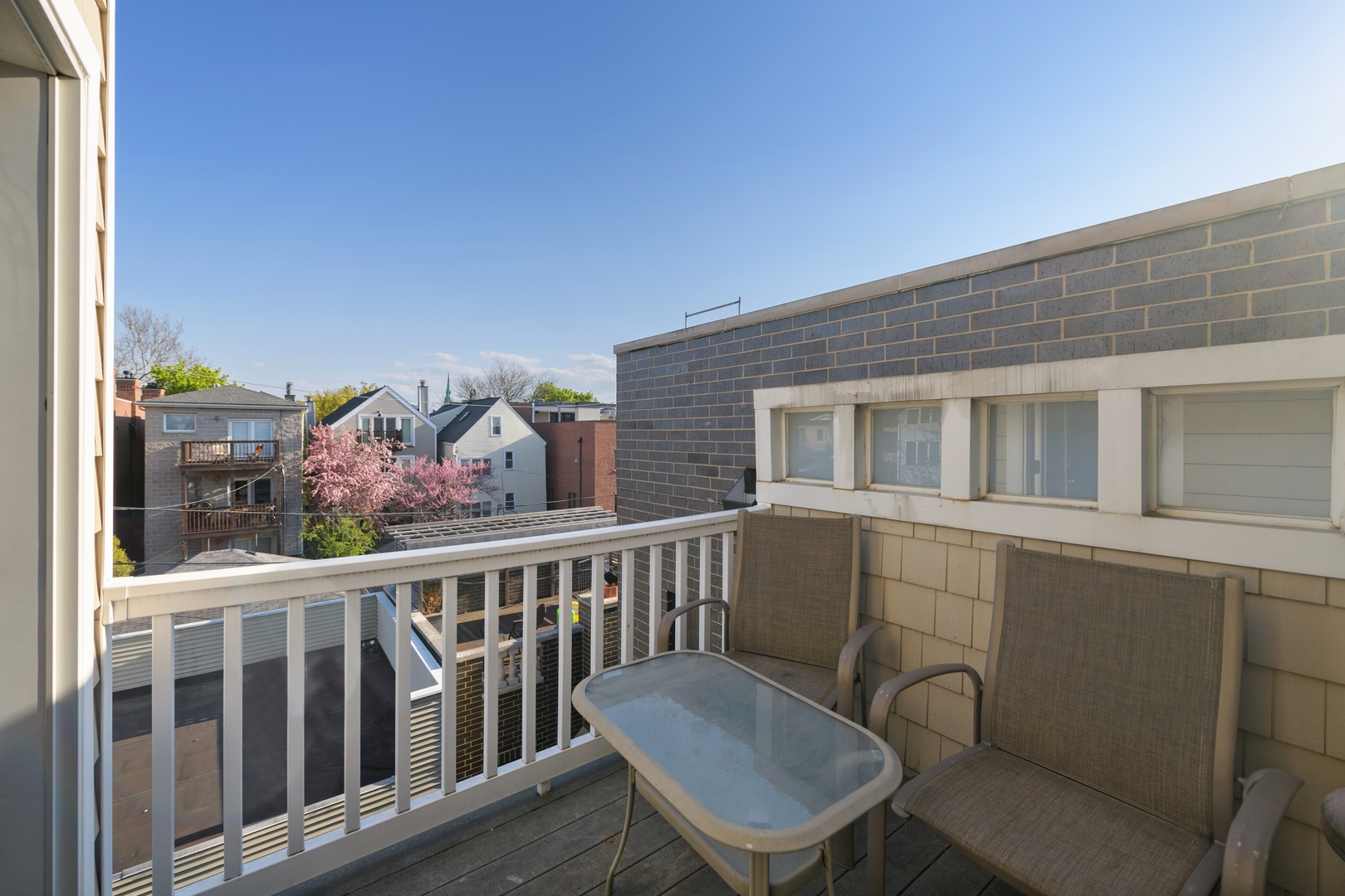 Undisclosed Address Chicago, IL 60657 - Photo 16 of 18 a view of a chair and table in the balcony
