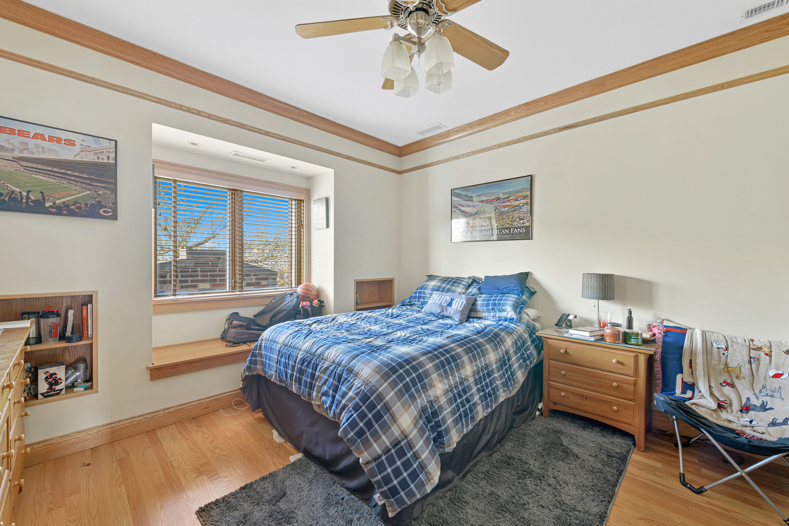 Undisclosed Address Chicago, IL 60657 - Photo 9 of 18 a bedroom with a bed dresser and a window