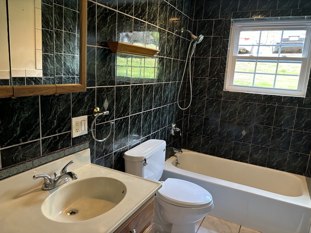 1 Walker Road, Unit 3 North Andover, MA 01845 - Photo 11 of 13 a bathroom with a sink toilet and shower