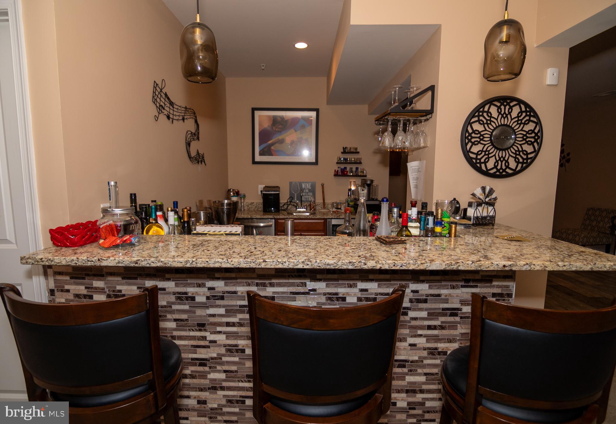 11013 Jumping Way Upper Marlboro, MD 20772 - Photo 20 of 51 a room with granite countertop kitchen island stainless steel appliances a stove and a sink
